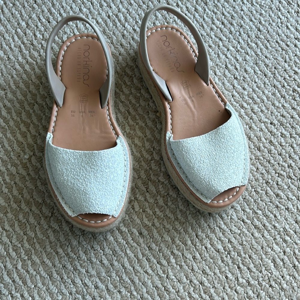 Norkinas white sparkle platform espradrilles.